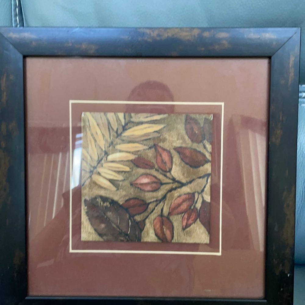 Leave print, brown and tan tones. Framed and matted